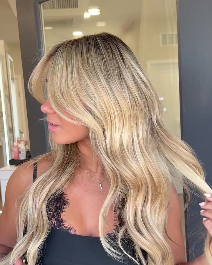 Blonde with curtain bangs