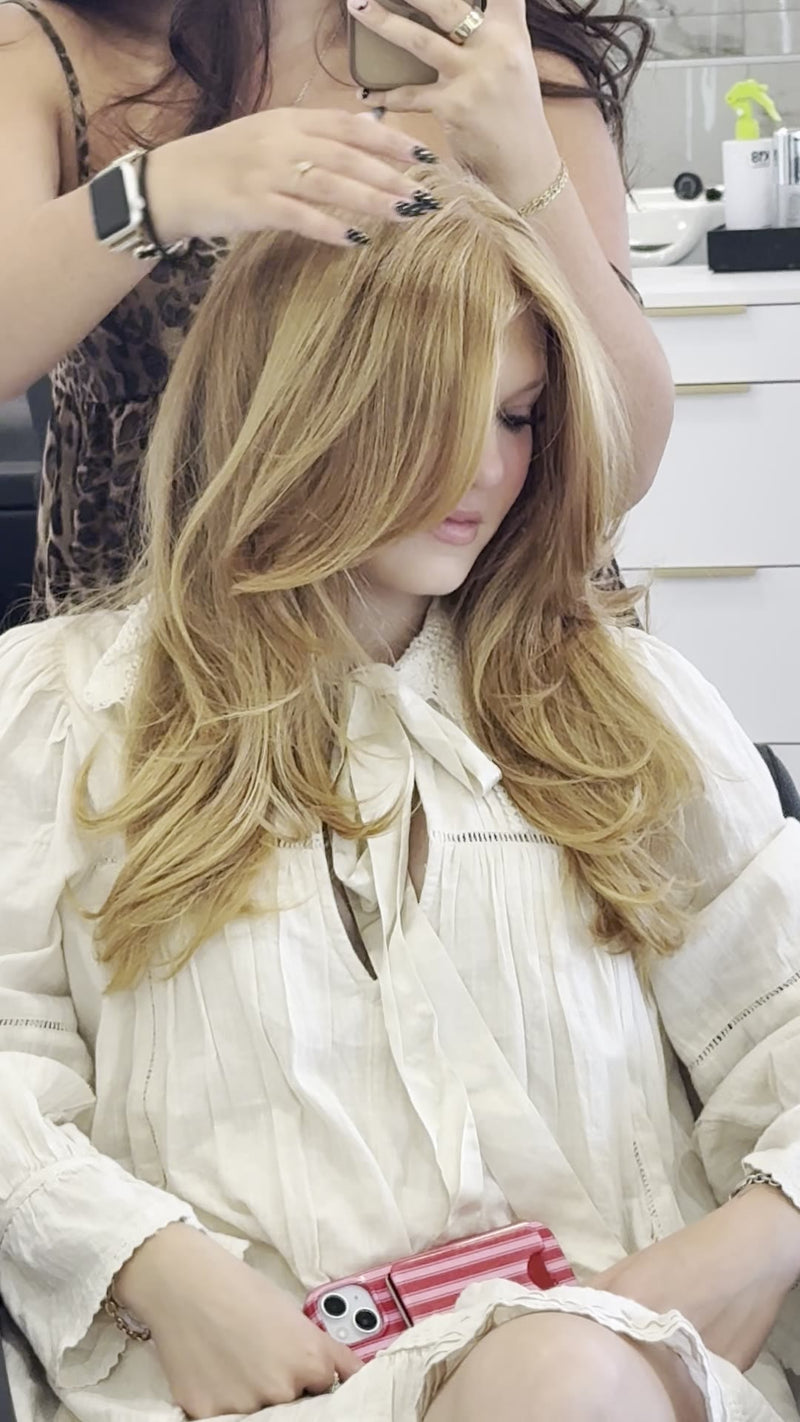 Strawberry blonde with soft layers