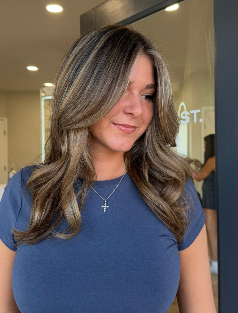 Caramel brunette with face-framing highlights