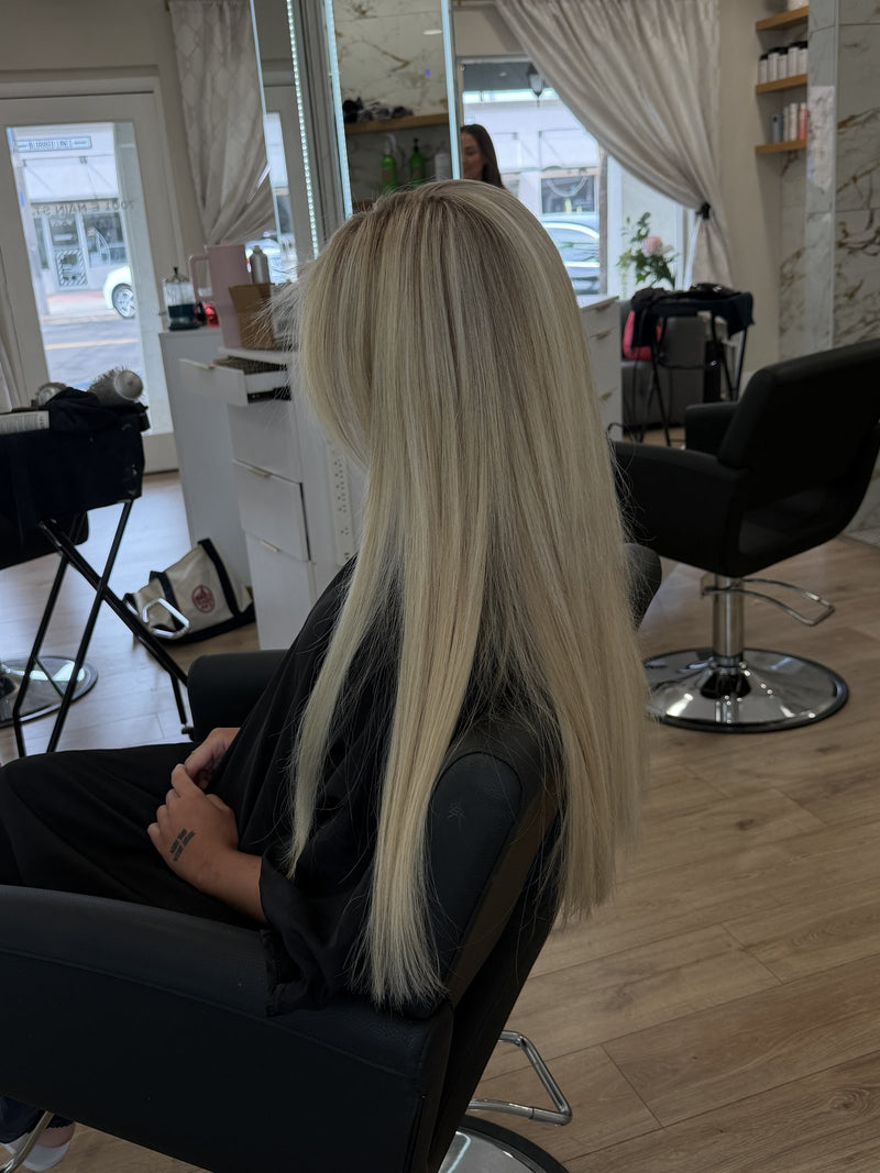 Sleek blonde with shadow root