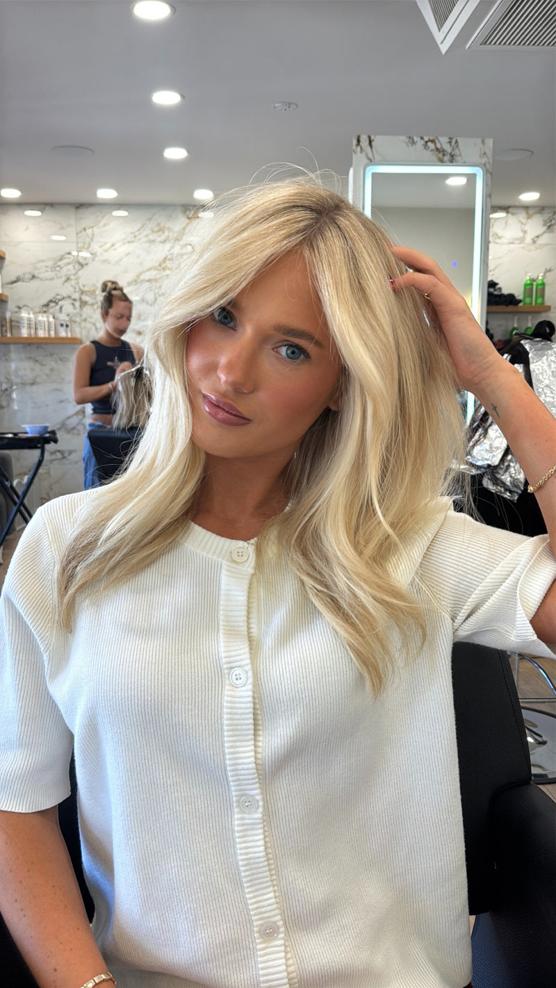 Golden blonde with soft waves