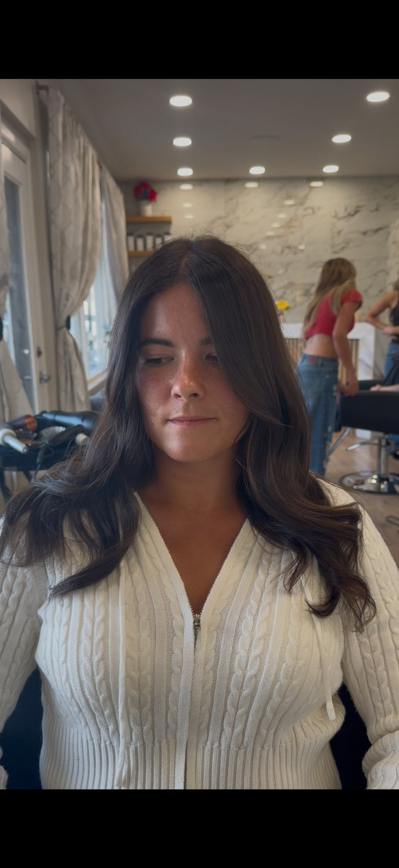 Rich brunette with soft waves